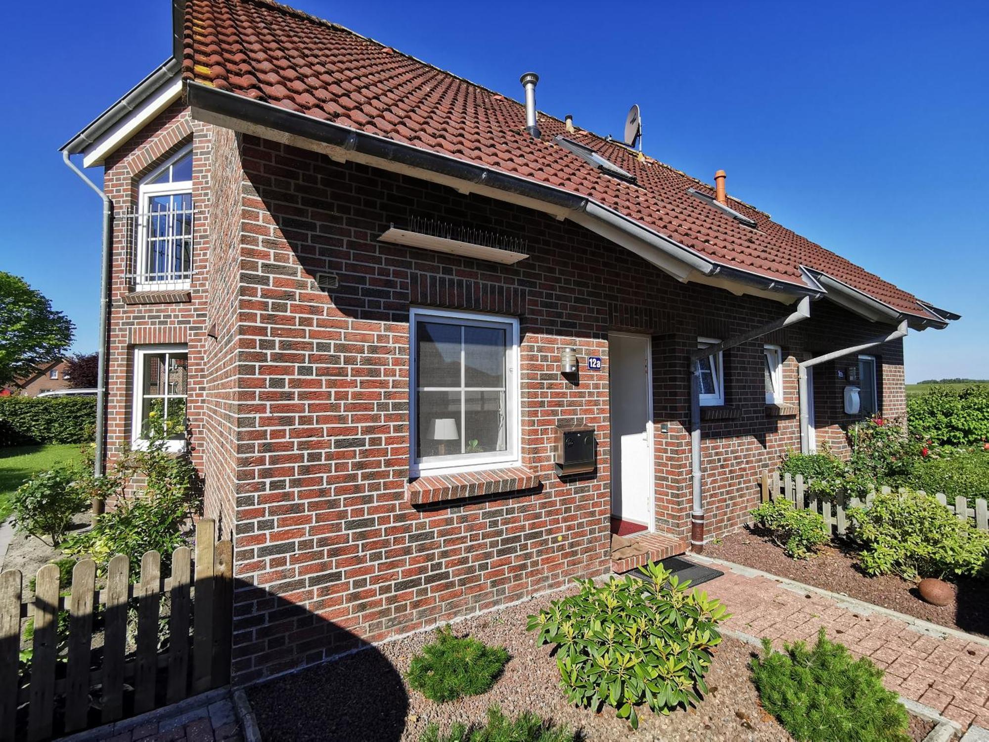 Friesenhaus Duewels Hus Villa Greetsiel Bagian luar foto
