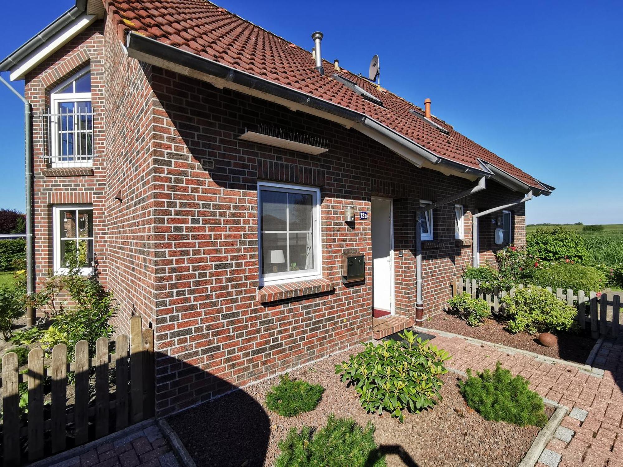 Friesenhaus Duewels Hus Villa Greetsiel Bagian luar foto